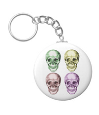 Details of the human skull singularly and in groups, in various colors and arrangements. Keyrings / keychains